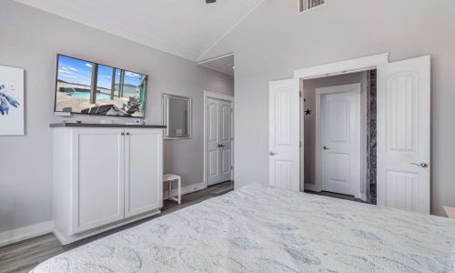 Bright, modern bedroom at Gulf Waters Beach Front RV Resort with ocean view.