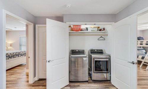Laundry area with washer and dryer at Gulf Waters Beach Front RV Resort.
