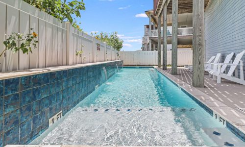 Relaxing pool at Gulf Waters Beach Front RV Resort with ocean view.