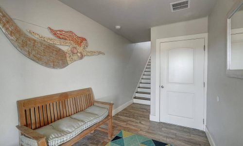Interior view of Gulf Waters Beach Front RV Resort with bench and staircase.
