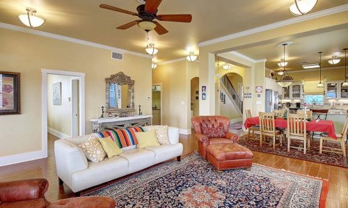 Spacious living area at Gulf Waters Beach Front RV Resort with cozy seating and elegant decor.