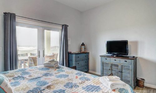 Cozy bedroom at Gulf Waters Beach Front RV Resort with ocean view.