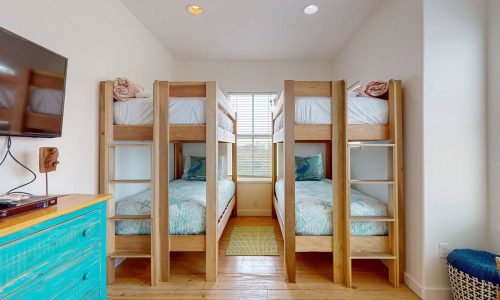 Bunk beds in a bright, clean room at Gulf Waters Beach Front RV Resort.