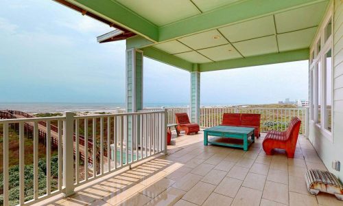 Balcony view at Gulf Waters Beach Front RV Resort with ocean scenery.